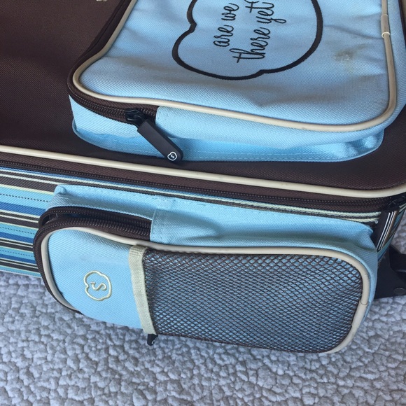 Adorable blue rolling child suitcase