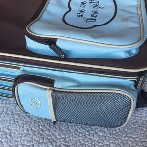 Adorable blue rolling child suitcase