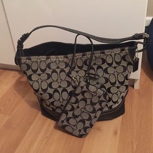 Medium size black and dark brown coach bag