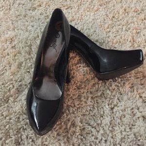 Carlos Santana black platform heels