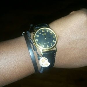 Black and Gold Casio watch