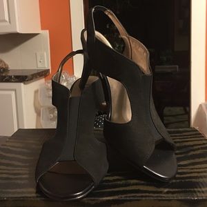 Moda Spana 3.5 inch slingback suede heels.