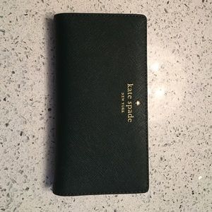 Authentic NWOT Kate Spade wallet. Forest green.