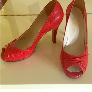 4 Inch red peep toe leather shoe.