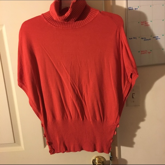 Trendy orange sweater with turtleneck