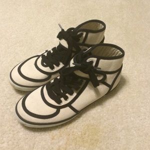 Cream and black high top sneakers