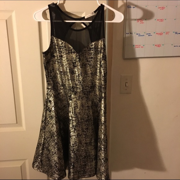 Cute shimmer A-line dress with sheer neck line