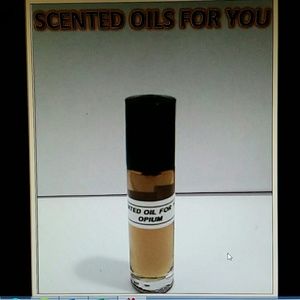 Opium Scented Body Oil. One  (1) 1/3 Oz
