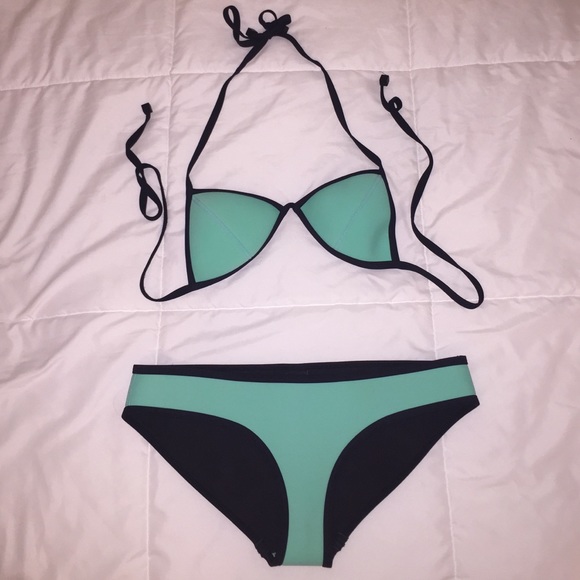 XS mint colored Triangl bikini with matching bag!