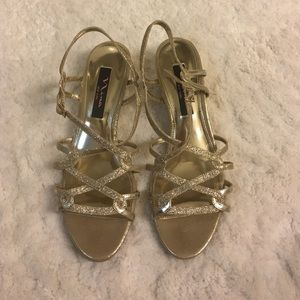 Gold Nina sandals with low wedge heel, size 7.5