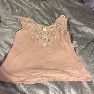 Pale pink floral accent tank