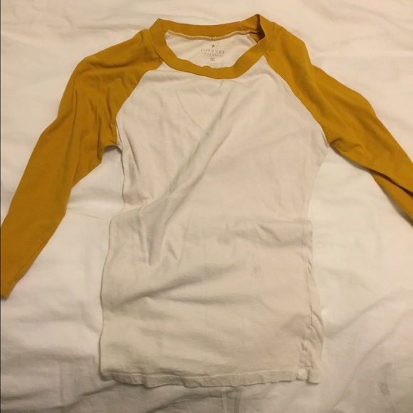yellow baseball top