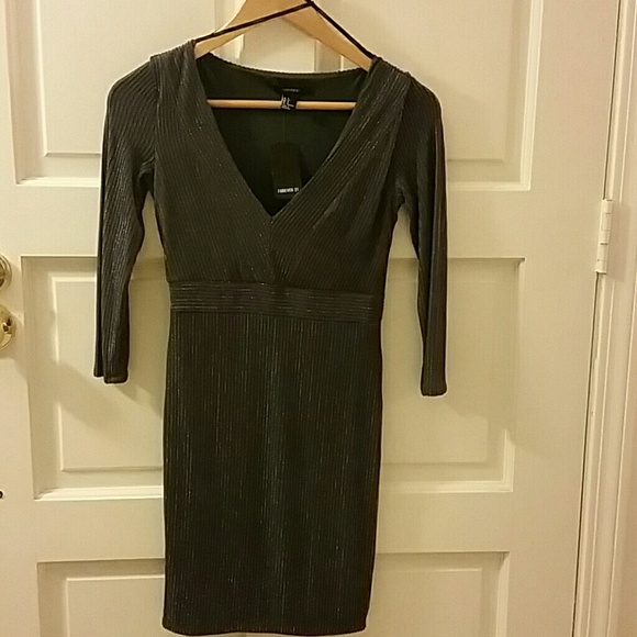NWT!!! NEVER worn! Sparkling v-neck dress.