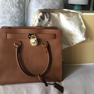 Real mk bag for sale asking $350 Obo