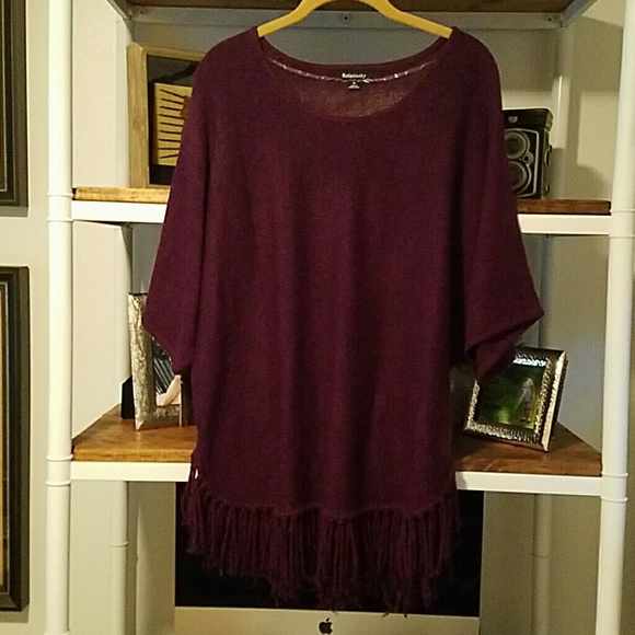 Purple sweater with fringe