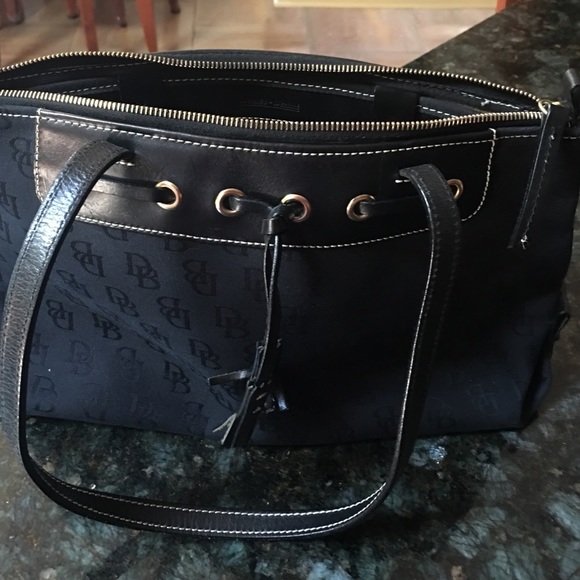 Dooney & Burke black large tassel top zip tote