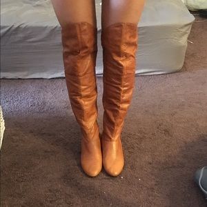 Over the knee brown winter boots