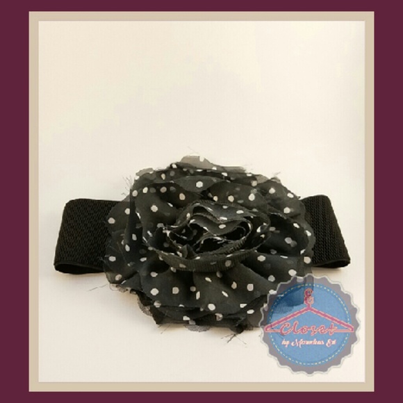 Thick black belt with oversized polka dot flower
