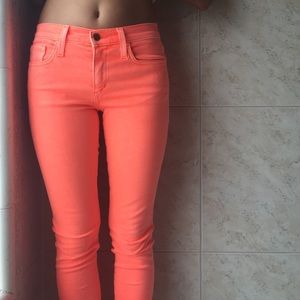 Bright salmon pink Joes skinny jeans