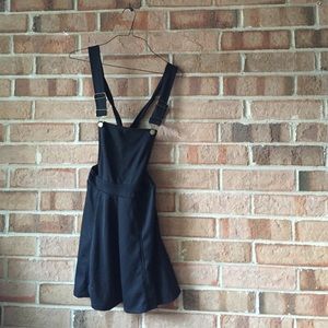 Small black overall dress