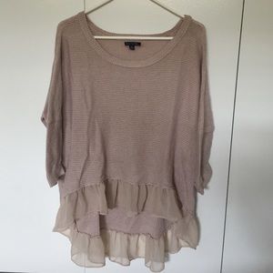 Slouchy dolman sweater with flounce hem
