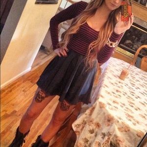 Maroon and black body suit