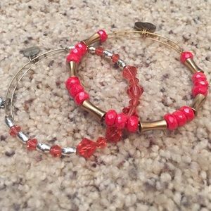Two coral Alex and Ani beaded bracelets