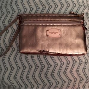 Authentic Michael Kors rose gold large wristlet