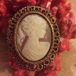 Vintage lucite engraved cameo brooch