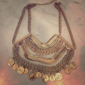 Gold chain necklace with adjustable length clasp