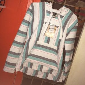 Grey and mint poncho from Zumiez