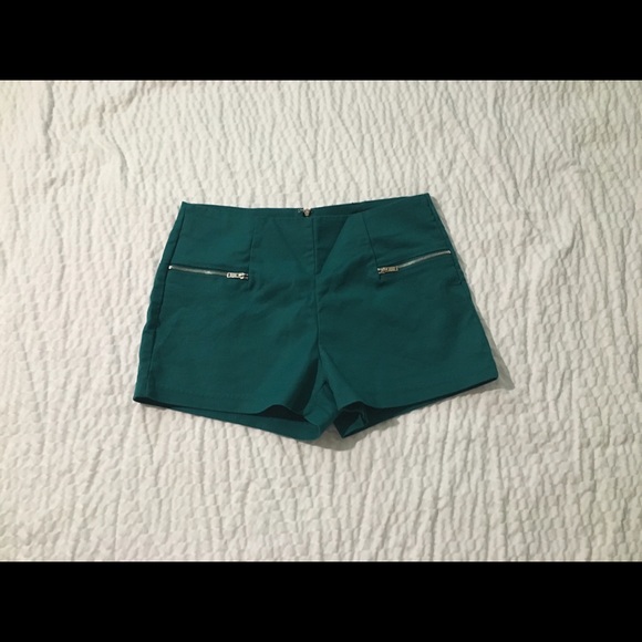 Teal shorts.