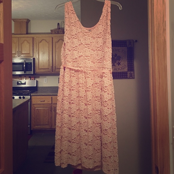 Blush pink dress with lace overlay.