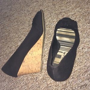 black hells with accent bow at toe