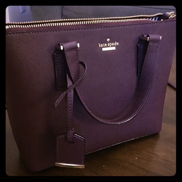 Kate Spade satchel handbag with tag and dust bag.