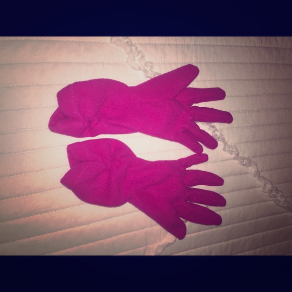 Pink fleece gloves.