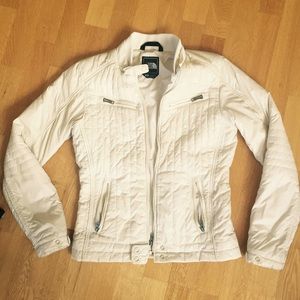 North face cream colored Moto style jacket.