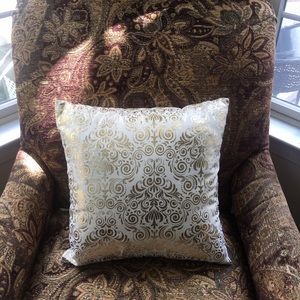 Gold and white decorative pillows