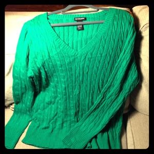 Emerald green v-neck sweater.