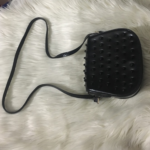 Black studded clutch