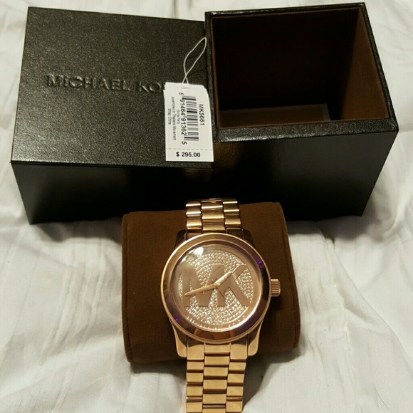 Michael Kors Rose colored watch.