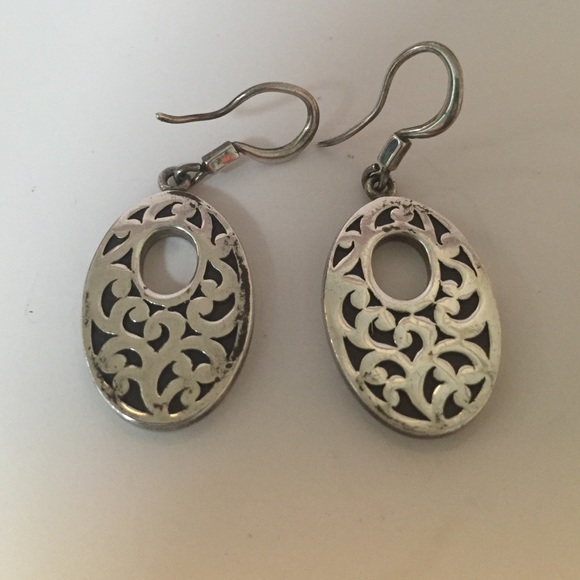 Solid Sterling Silver earrings. Stamped 925.