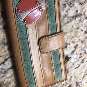 Fossil ladybug wallet gently used