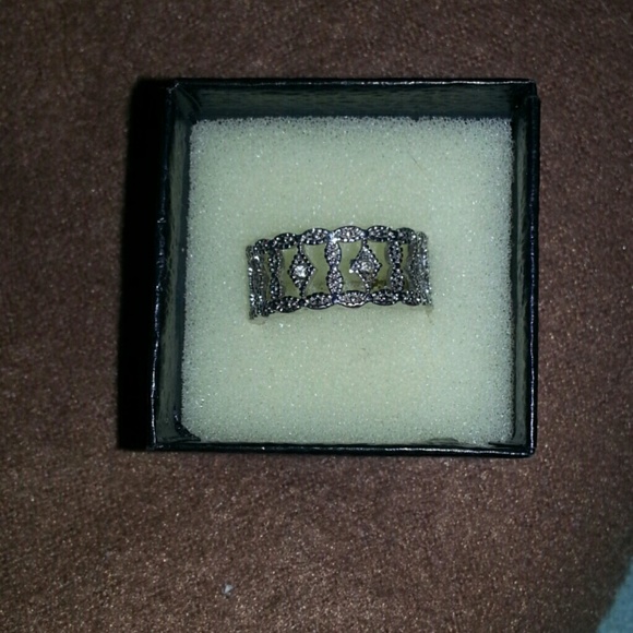 Costume jewelry silver ring with rhinestones