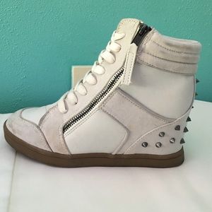 Rock & Republic wedge sneakers... Trendy, spiky!