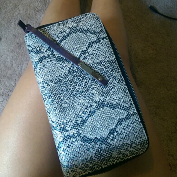 Deena & Ozzy snake skin clutch