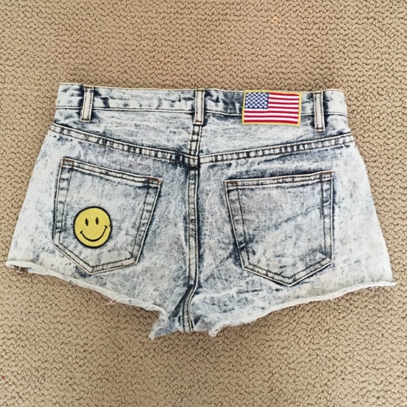 Distressed acid wash Jean shorts with patches