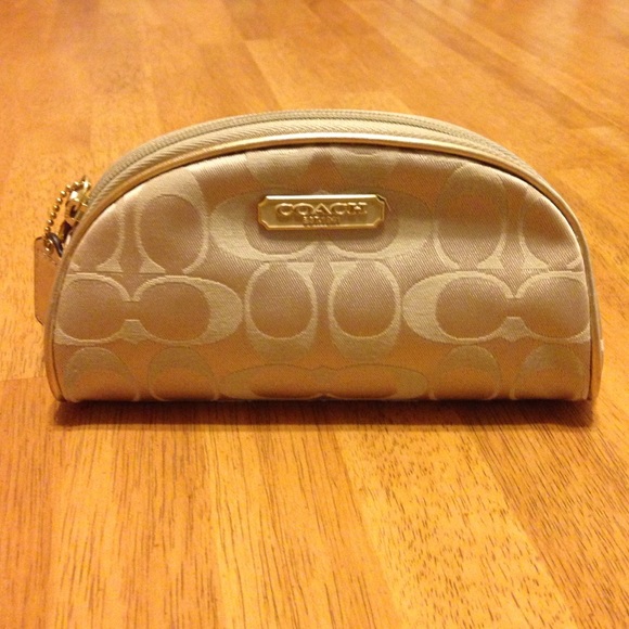 COACH small gold pouch for inside purse-never used