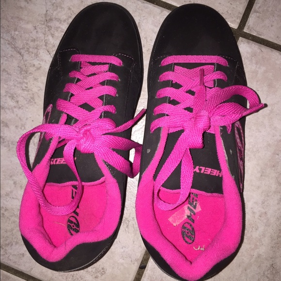 Black Heelys in like Brand New Condition