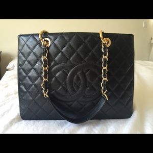 Authentic Chanel GST in black caviar with gold hw